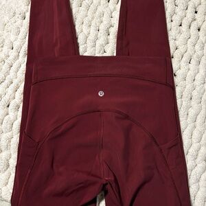 EUC LULULEMON POWER THRU 28” high rise tights Red Merlot